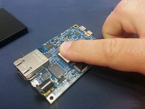 Apply light pressure to the protective back of the tape for 30 seconds